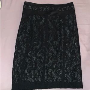 Knee length black lace skirt